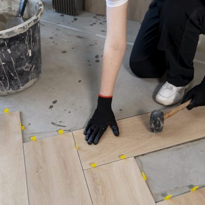 high-angle-worker-tiling-floor